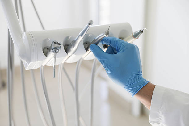 Professional Tooth Extraction technician working in La Fayette, AL
